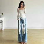 توب قصير غير متماثل بأكمام طويلة وكشكش — صورة 2