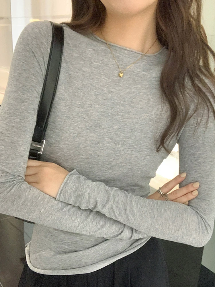 تيشيرت بأكمام طويلة وخصر مكشكش