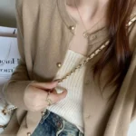 كارديجان بلون سادة بأزرار أمامية — صورة 3
